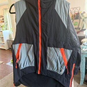 FP Movement Black and Orange Sleeveless Windbreaker Vest - Packable Utility Vest